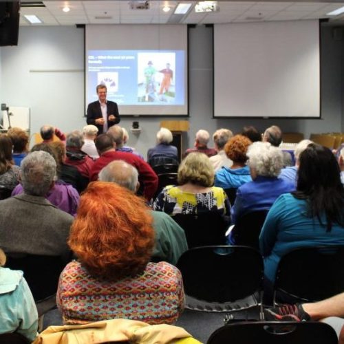 Public Education course being taught to group of adults