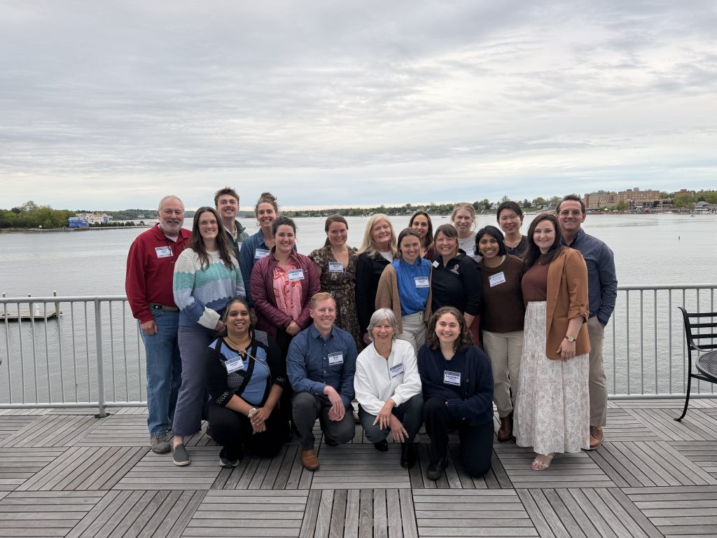 Maryland Sea Grant staff together on a deck overlooking a body of water