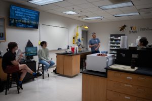 Dr. Bachvaroff presenting to the interns in a classroom setting
