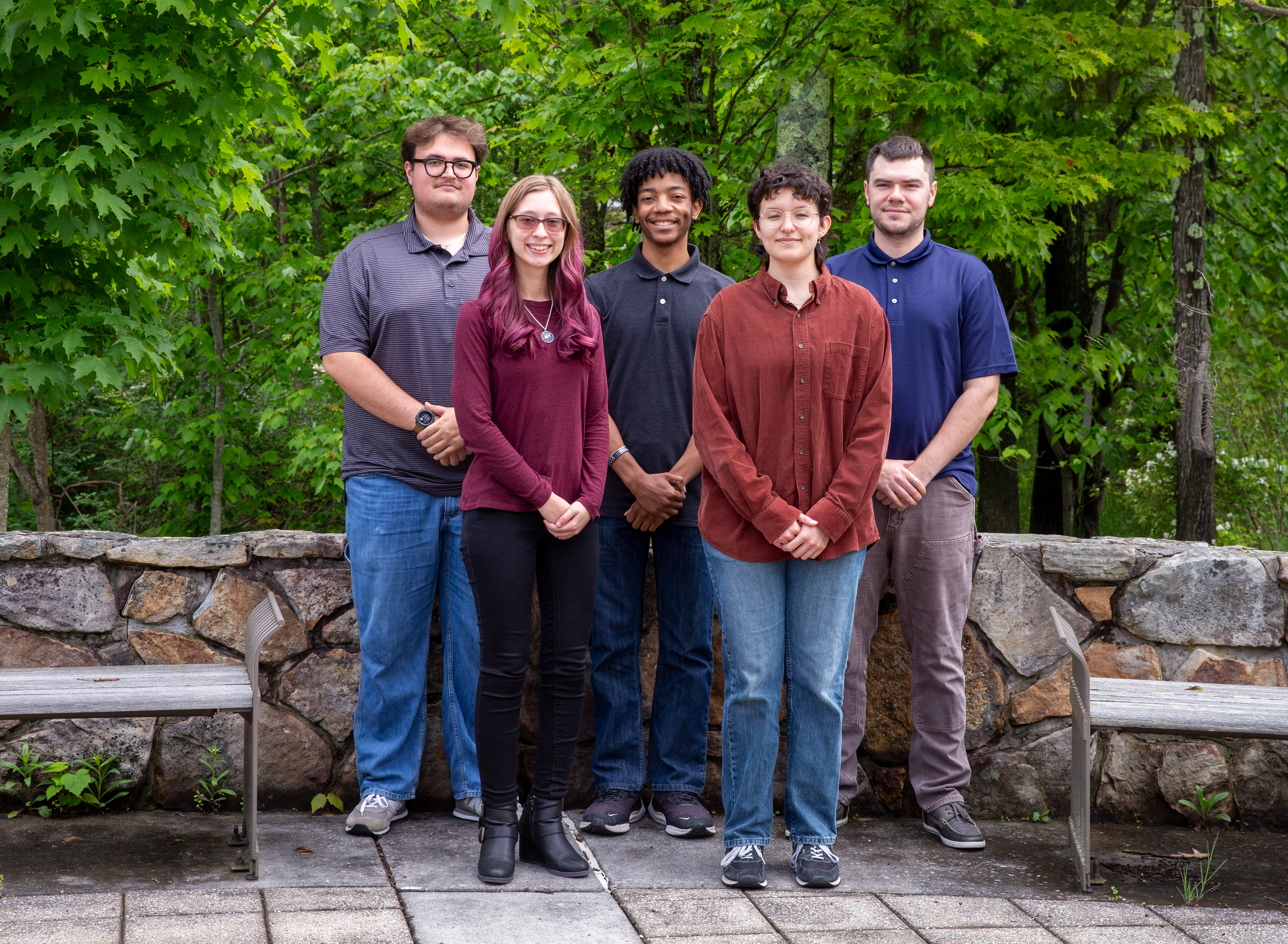 2026 Interns on first day of orientation in formal group shot outside. 