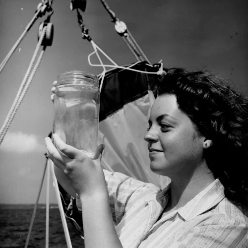 UMCES woman with glass jar BW