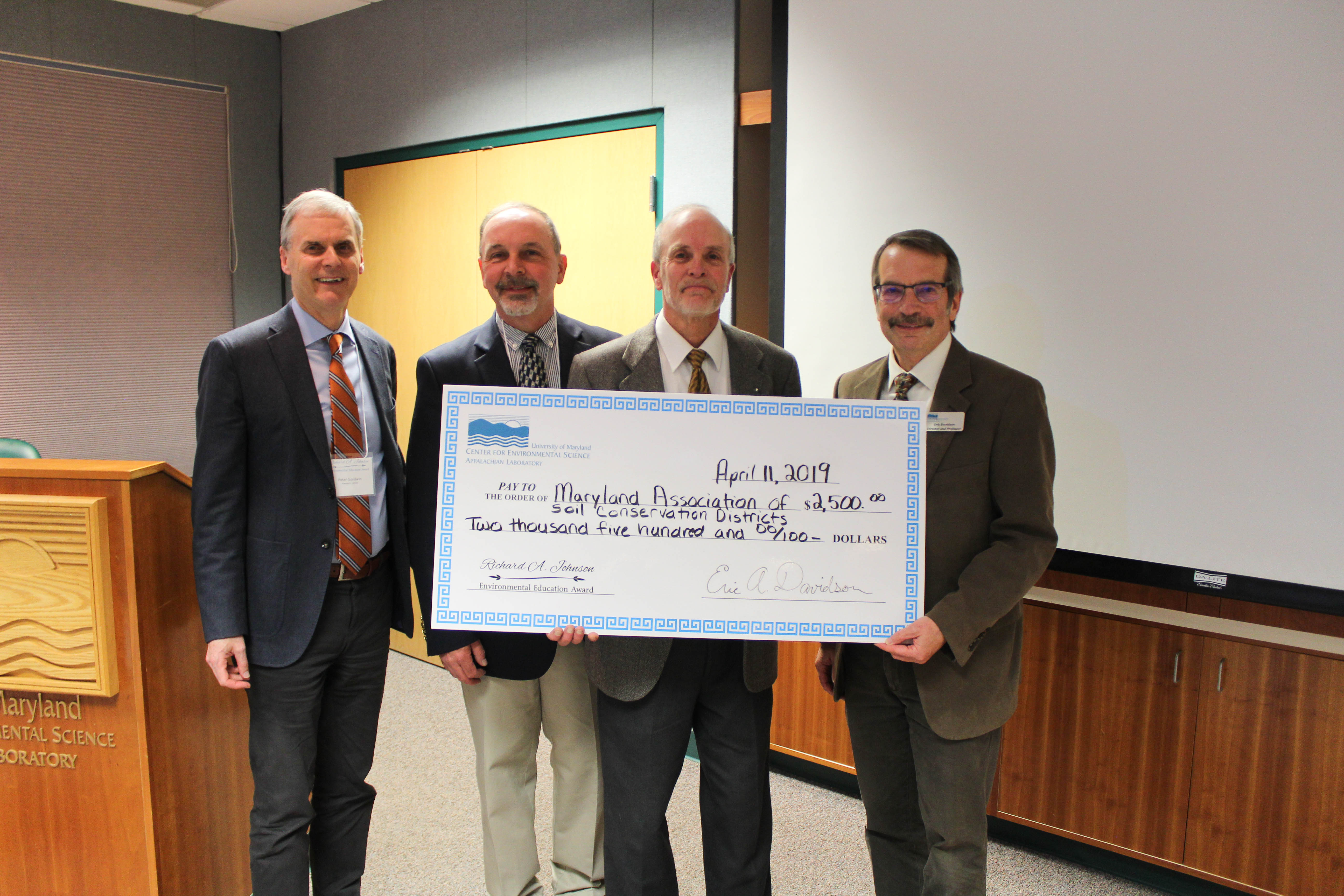 Johnson Award winner Craig Hartsock with Peter Goodwin, Jim Mullan, and Eric Davidson.