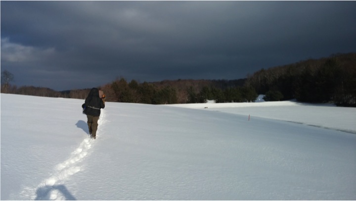 Caroline Coulter walks through the snow.