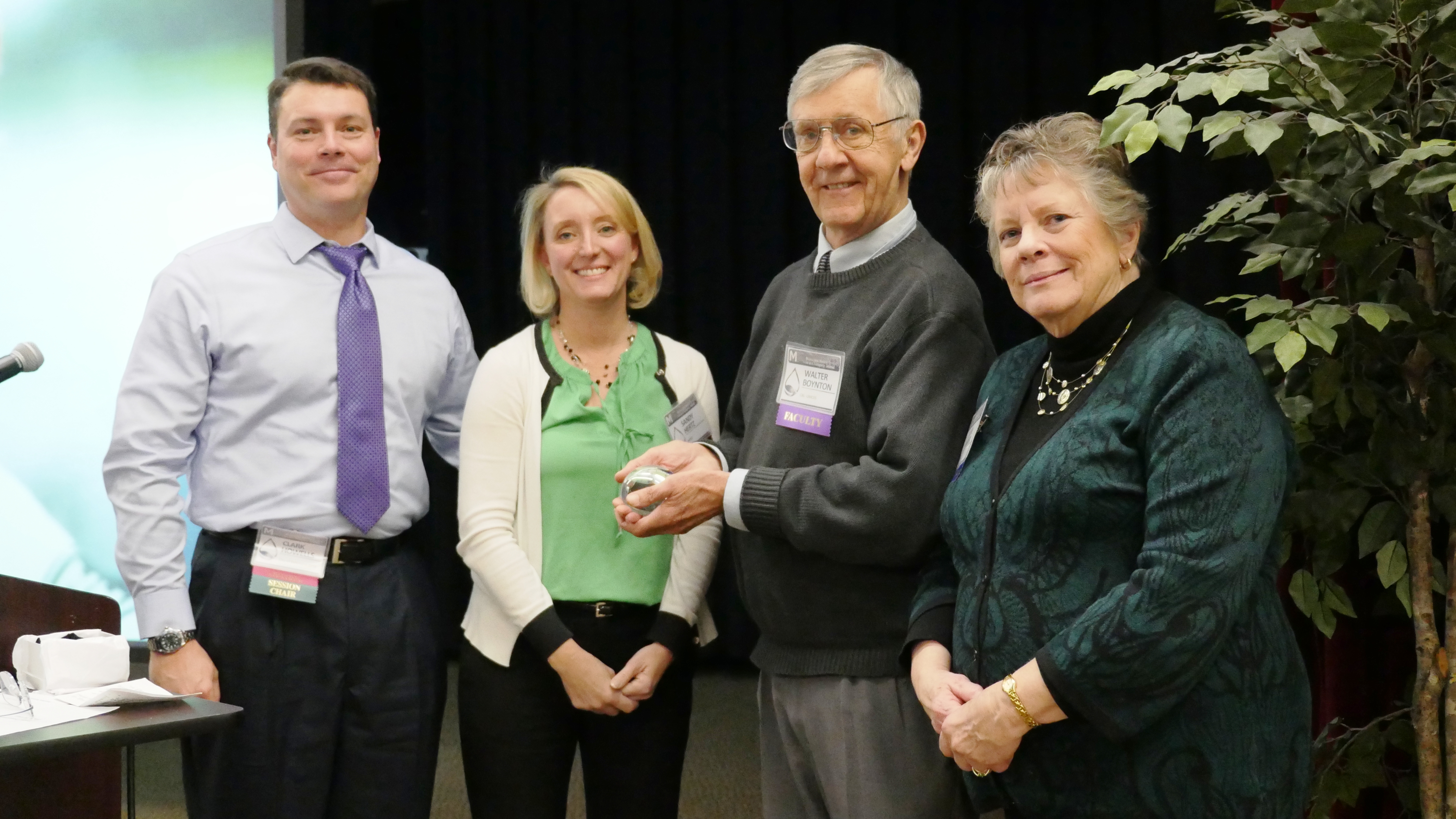 Walter Boynton receives the Carl S. Weber Award.