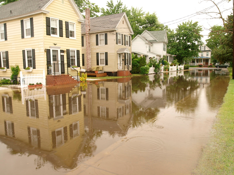 Houses surrounded by high water in Cambridge, MD by Dave Harp