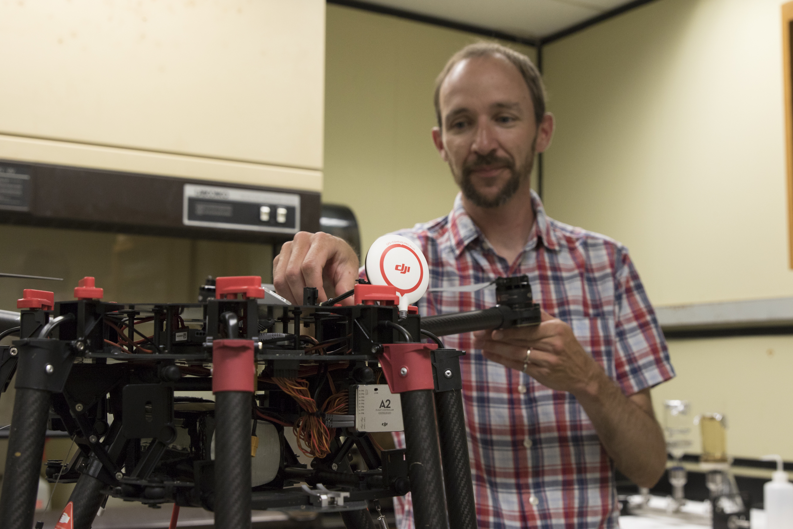 Greg Silsbe with the drone in Horn Point Laboratory