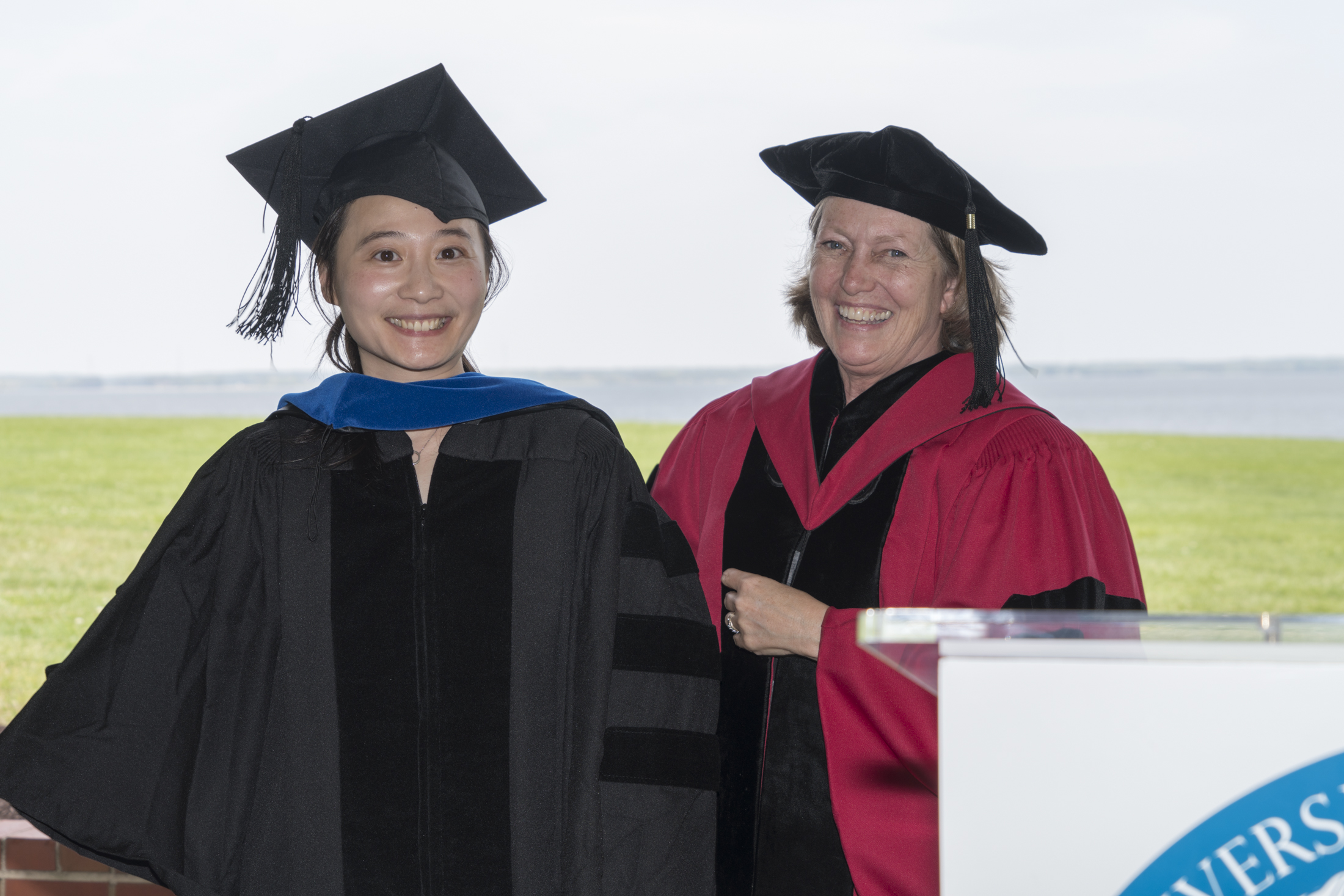 Chih-Hsien “Michelle” Lin is hooded by Professor Pat Glibert at UMCES' 2018 Commencement