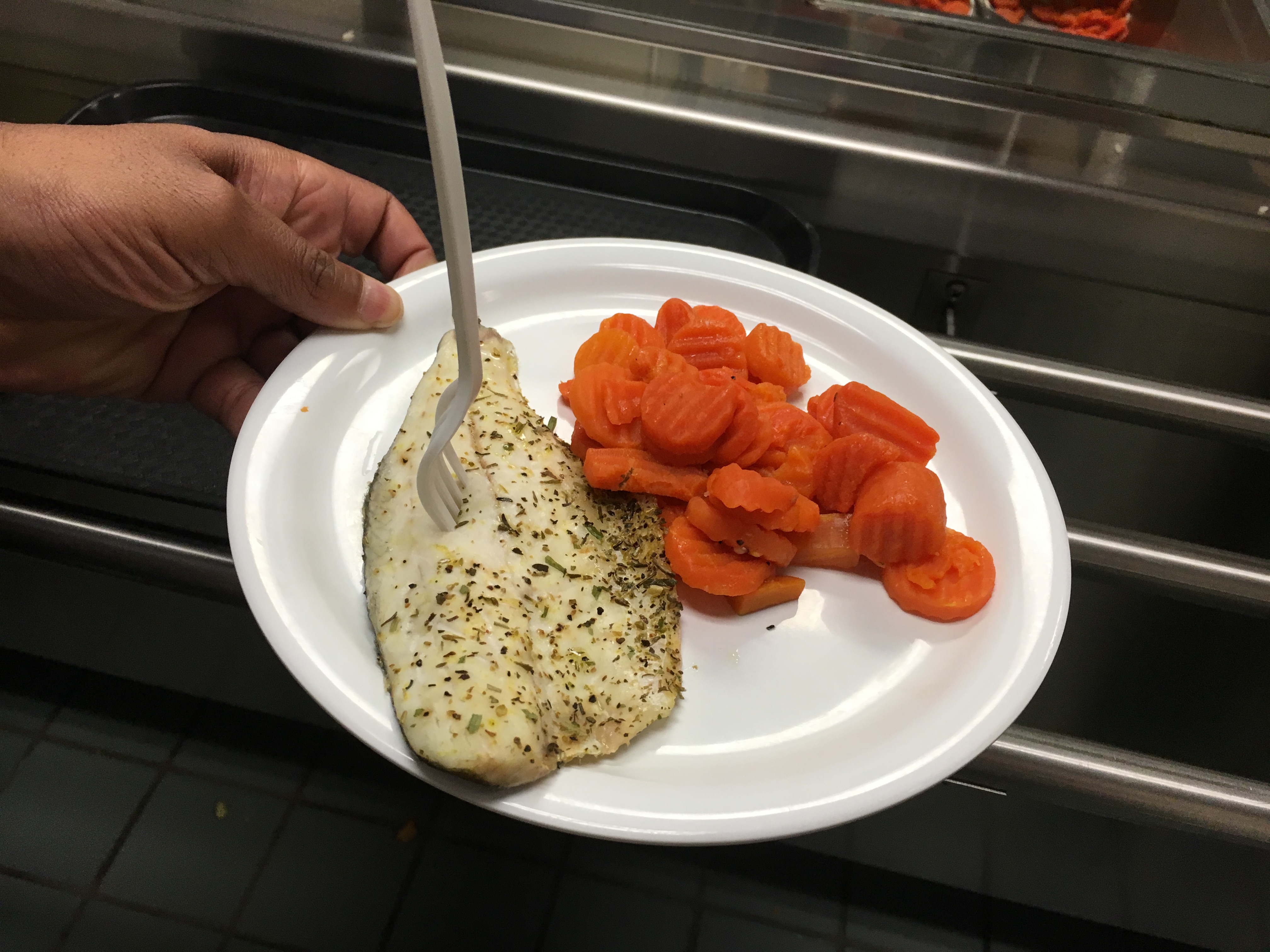 Plate with fish and carrots