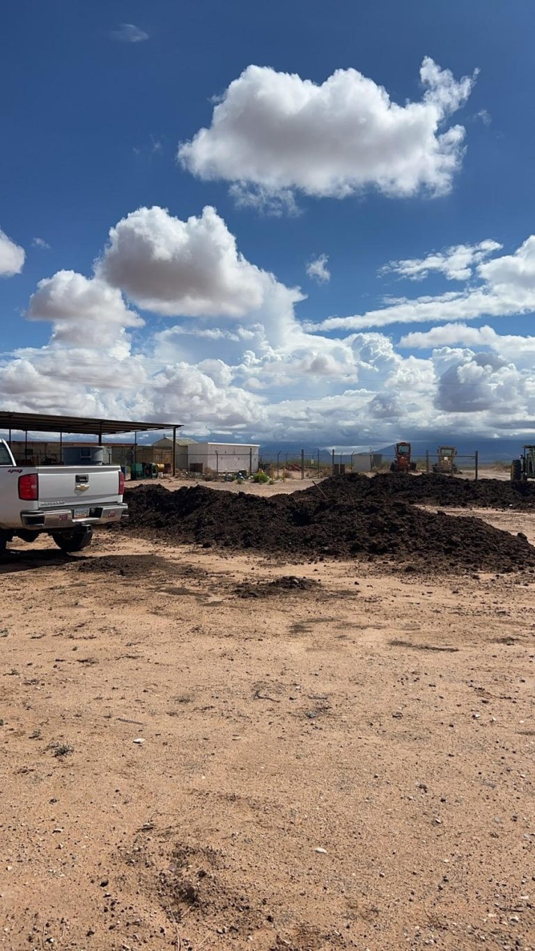 A manure pile in an arid field