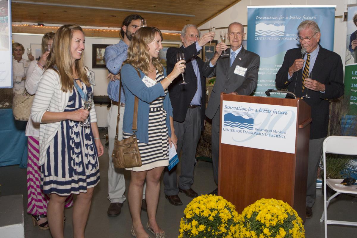 Graduate students toasting UMCES' 90th anniversary with UMCES President Don Boesch and 90th Celebration Honorary Co-Chairs Maryland Senator Bernie Fowler and The Honorable Harry Hughes.